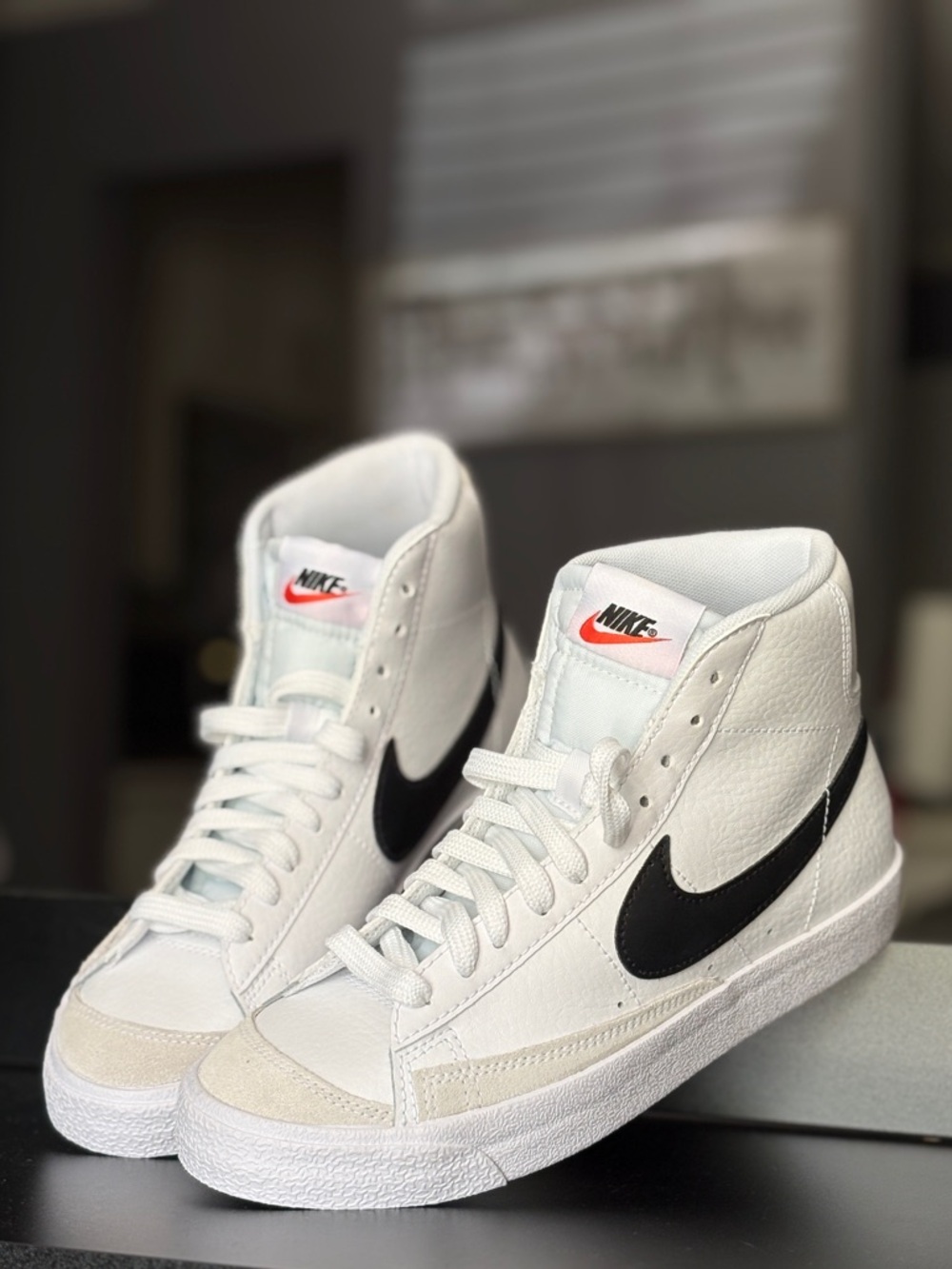 Nike High-Top White Leather Sneakers with Black Swoosh